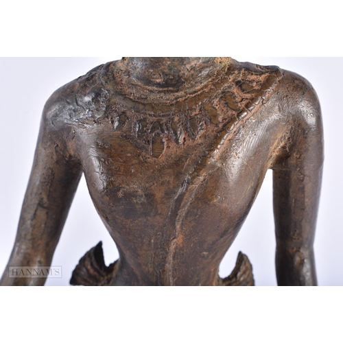 386 - AN EARLY SOUTH EAST ASIAN BRONZE FIGURE OF A STANDING BUDDHA. 34.5 cm high.