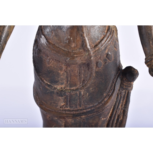 386 - AN EARLY SOUTH EAST ASIAN BRONZE FIGURE OF A STANDING BUDDHA. 34.5 cm high.