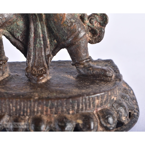 387 - AN 18TH CENTURY INDIAN BRONZE FIGURE OF KALI. 11.5 cm x 7 cm.