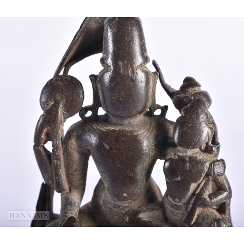 391 - A 13TH/14TH CENTURY INDIAN BRONZE FIGURE OF SHIVA PARVATI. 10.5 cm x 6.5 cm.