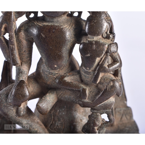 391 - A 13TH/14TH CENTURY INDIAN BRONZE FIGURE OF SHIVA PARVATI. 10.5 cm x 6.5 cm.