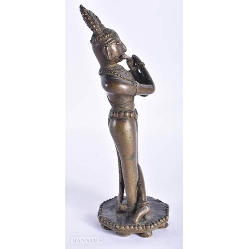 398 - A RARE 18TH CENTURY INDIAN BRONZE FIGURE OF KRISHNA unusually modelled with one leg reversed. 18cm h... 