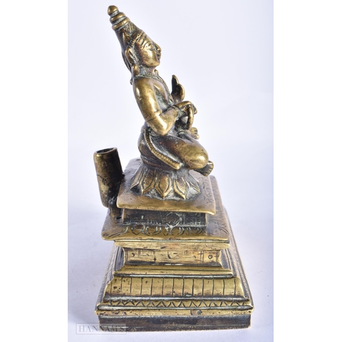 399 - AN 18TH/19TH CENTURY INDIAN BRONZE FIGURE OF SHIV AND PARVATI. 17 cm x 12 cm.