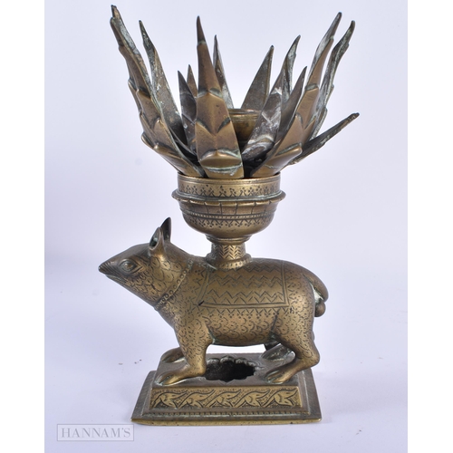 40 - AN UNUSUAL 18TH/19TH CENTURY INDIAN BRONZE LOTUS FORM OIL LAMP formed as a standing animal engraved ... 