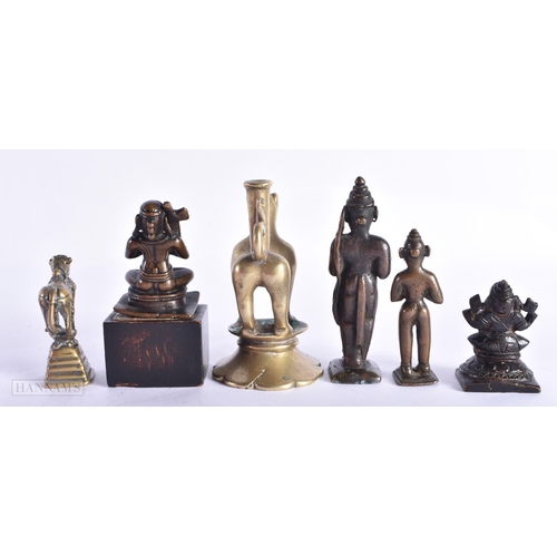 401 - A GROUP OF SIX 18TH/19TH CENTURY INDIAN BRONZE DEITIES. Largest 10 cm high. (6)