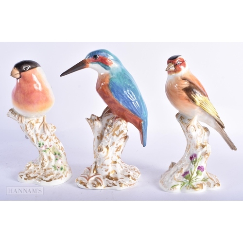 404 - THREE ROYAL WORCESTER PORCELAIN BIRDS. 14cm high. (3)