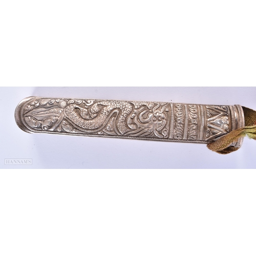 412 - TWO 19TH CENTURY TIBETAN SILVER MOUNTED DAGGERS. Largest 36 cm long. (2)  We do not offer in-house s... 