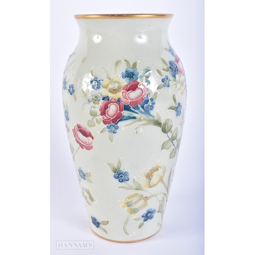 414 - A MOORCROFT FLORIAN WARE PORCELAIN VASE. 18cm high.