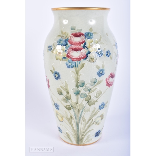 414 - A MOORCROFT FLORIAN WARE PORCELAIN VASE. 18cm high.