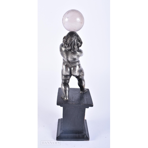 417 - AN UNUSUAL 19TH CENTURY SILVERED BRONZE AND ROCK CRYSTAL GRAND TOUR PUTTI. 25 cm high.