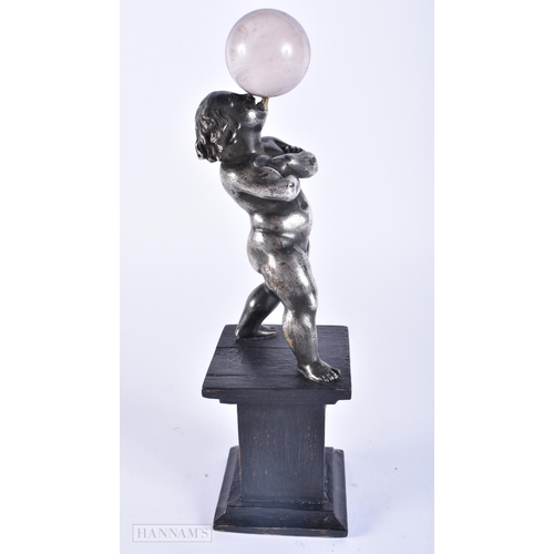 417 - AN UNUSUAL 19TH CENTURY SILVERED BRONZE AND ROCK CRYSTAL GRAND TOUR PUTTI. 25 cm high.