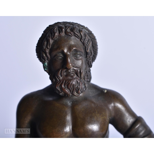 418 - A 19TH CENTURY EUROPEAN GRAND TOUR BRONZE FIGURE OF A MALE modelled upon a labradorite base. 21.5 cm... 