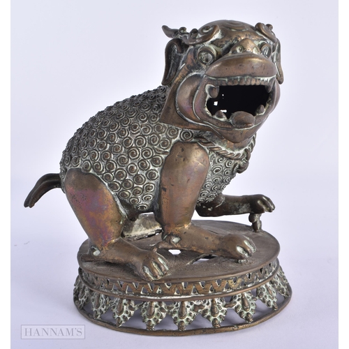 42 - AN 18TH/19TH CENTURY INDIAN PERSIAN BRONZE BEAST modelled scowling. 18cm x 15cm.