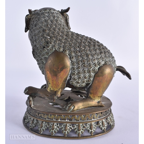 42 - AN 18TH/19TH CENTURY INDIAN PERSIAN BRONZE BEAST modelled scowling. 18cm x 15cm.