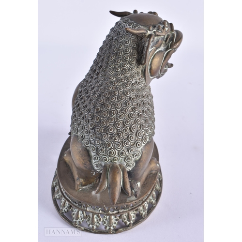 42 - AN 18TH/19TH CENTURY INDIAN PERSIAN BRONZE BEAST modelled scowling. 18cm x 15cm.