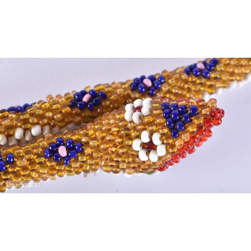 420 - A TURKISH PRISONER OF WAR BEADWORK SNAKE. 95 cm long.