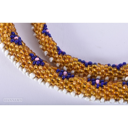 420 - A TURKISH PRISONER OF WAR BEADWORK SNAKE. 95 cm long.