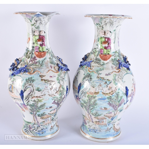 430 - A RARE LARGE PAIR OF 19TH CENTURY CHINESE FAMILLE VERTE PORCELAIN VASES QIng. 43 cm x 18cm.