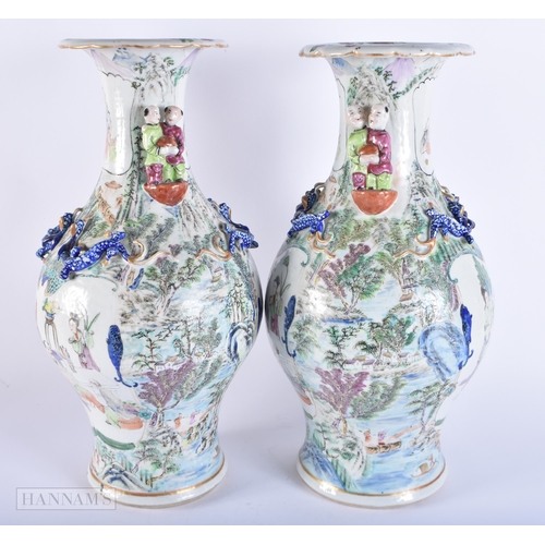 430 - A RARE LARGE PAIR OF 19TH CENTURY CHINESE FAMILLE VERTE PORCELAIN VASES QIng. 43 cm x 18cm.