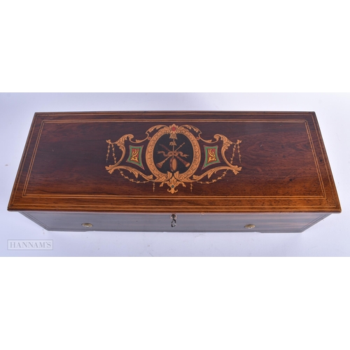 452 - AN ANTIQUE SWISS NICOLE FRERES SIX AIRS MUSIC BOX. 45cm x 18cm.