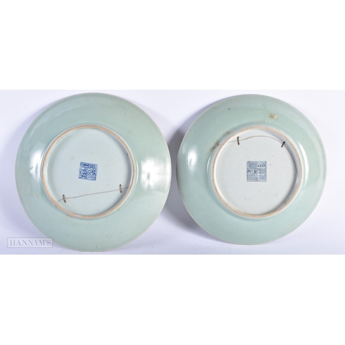 462 - A LARGE PAIR OF 19TH CENTURY CHINESE CANTON FAMILLE ROSE CELADON DISHES Qing. 22.5 cm diameter.