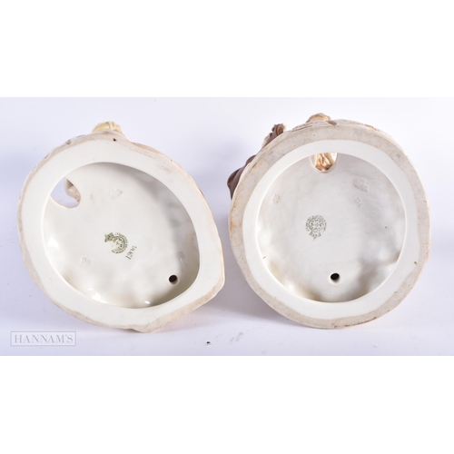 466 - A PAIR OF ROYAL WORCESTER BLUSH IVORY PORCELAIN WATER CARRIERS. Largest 34 cm high. (2)