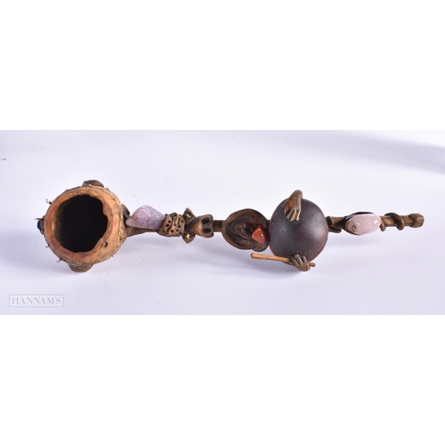 467 - A TRIBAL PIPE together with an agateware porcelain pen dish etc. (4)