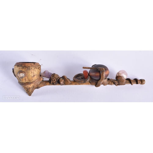 467 - A TRIBAL PIPE together with an agateware porcelain pen dish etc. (4)