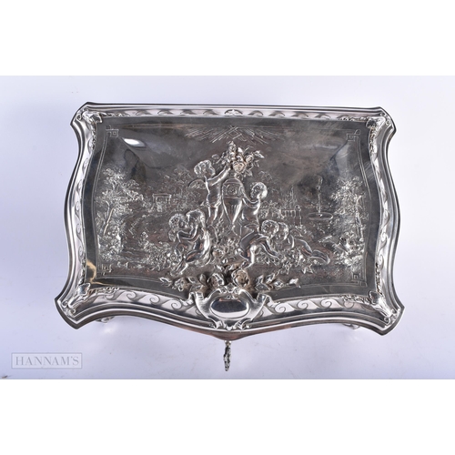 470 - A LARGE VICTORIAN WALKER & HALL SILVER PLATED REPOUSSE CASKET decorated with figures within landscap... 