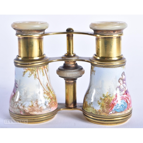 472 - A FINE PAIR OF VIENNESE SWISS ENAMEL OPERA GLASSES painted with figures within landscapes. 10 cm x 8... 