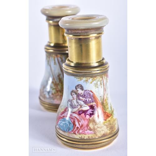 472 - A FINE PAIR OF VIENNESE SWISS ENAMEL OPERA GLASSES painted with figures within landscapes. 10 cm x 8... 