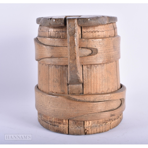 4 - AN ANTIQUE SCANDINAVIAN CARVED WOOD BANDED TANKARD. 16 cm x 14cm.