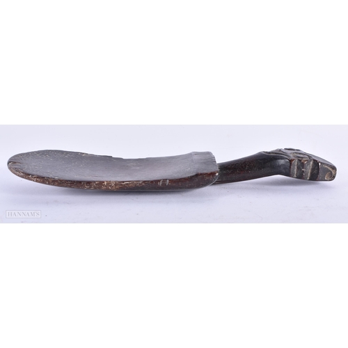 475 - A TRIBAL CARVED WOOD LIME SPATULA. 24 cm long.