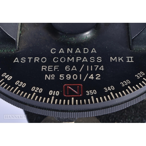 49 - A BOXED MILITARY CANADA ASTRO MK II COMPASS. 24 cm high.