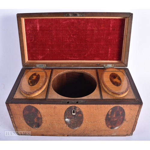 493 - AN EARLY 19TH CENTURY TORTOISESHELL INSET CARVED WOOD TEA CADDY together with a Victorian work box. ... 