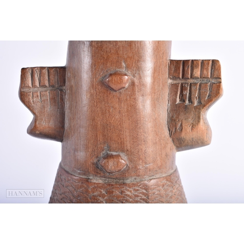 499 - AN AFRICAN TRIBAL CARVED WOOD FIGURE. 30 cm high.