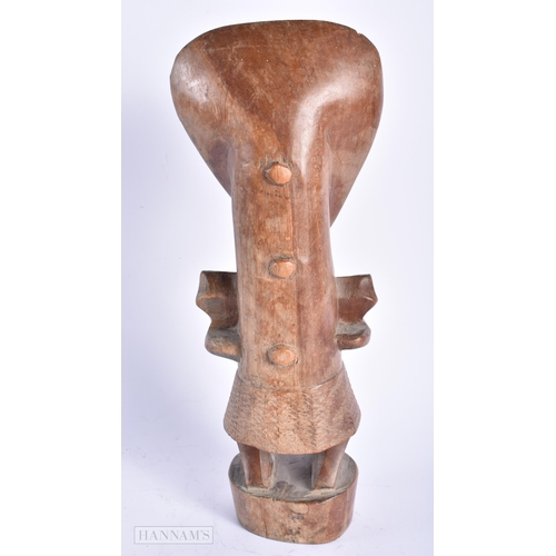 499 - AN AFRICAN TRIBAL CARVED WOOD FIGURE. 30 cm high.