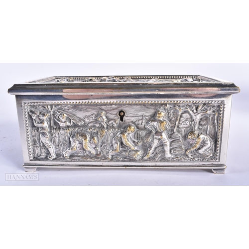 502 - AN ANTIQUE SILVER PLATED REPOUSSE CASKET together with a rosewood box. Largest 23 cm wide. (2)