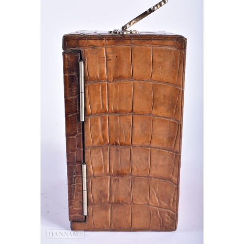 503 - A CHARMING VICTORIAN/EDWARDIAN LEATHER TRAVELLING SAFE. 20 cm high inc handle.