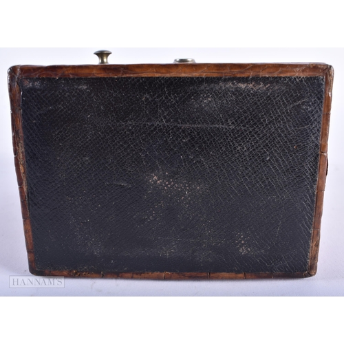 503 - A CHARMING VICTORIAN/EDWARDIAN LEATHER TRAVELLING SAFE. 20 cm high inc handle.