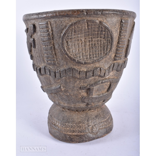 506 - AN AFRICAN TRIBAL CARVED WOOD MORTAR possibly Loango. 23 cm x 17 cm.