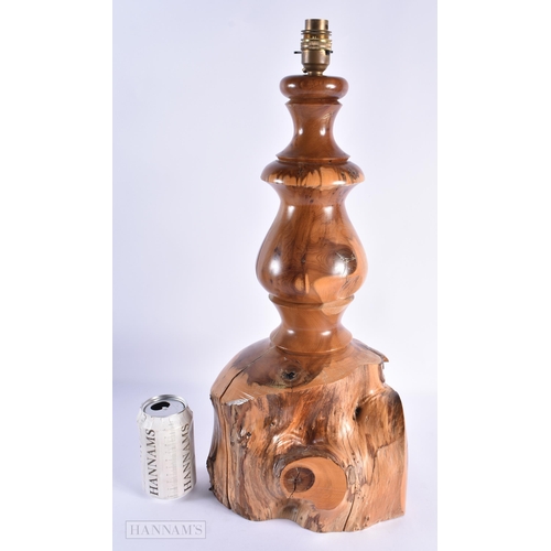 51 - A LARGE EARLY 20TH CENTURY YEW WOOD RUSTIC LAMP of naturalistic form. 52 cm x 22cm.