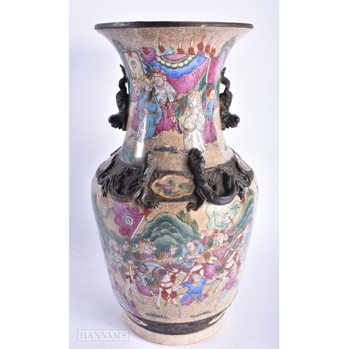 510 - A LARGE 19TH CENTURY CHINESE SANCAI GLAZED POTTERY FIGURE Qing, together with a canton famille rose ... 