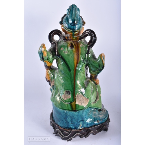 510 - A LARGE 19TH CENTURY CHINESE SANCAI GLAZED POTTERY FIGURE Qing, together with a canton famille rose ... 