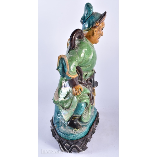 510 - A LARGE 19TH CENTURY CHINESE SANCAI GLAZED POTTERY FIGURE Qing, together with a canton famille rose ... 