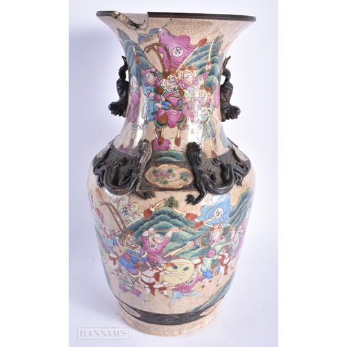 510 - A LARGE 19TH CENTURY CHINESE SANCAI GLAZED POTTERY FIGURE Qing, together with a canton famille rose ... 