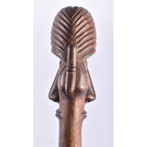 513 - A LARGE EASTER ISLANDS TRIBAL CARVED WOOD UA STAFF CLUB. 75 cm long.