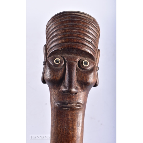 513 - A LARGE EASTER ISLANDS TRIBAL CARVED WOOD UA STAFF CLUB. 75 cm long.