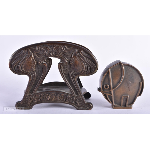 522 - AN ART DECO BRONZE ELEPHANT PAPERWEIGHT together with an Art Nouveau desk stand. Largest 13 cm wide.... 