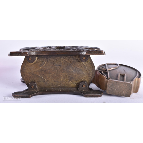 522 - AN ART DECO BRONZE ELEPHANT PAPERWEIGHT together with an Art Nouveau desk stand. Largest 13 cm wide.... 